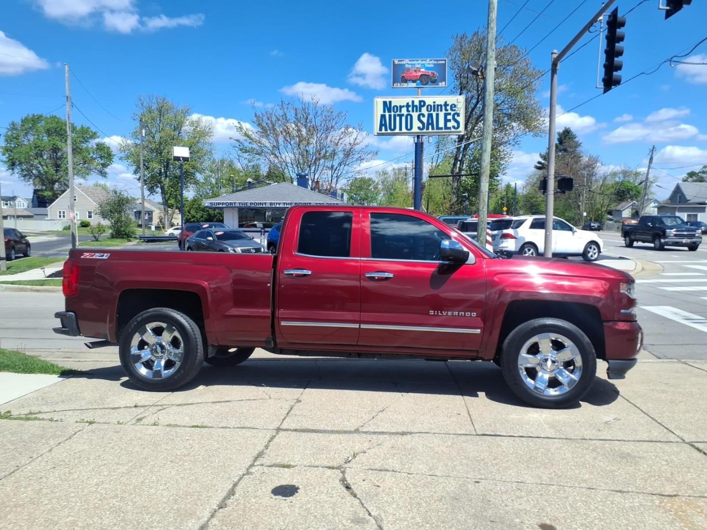 2016 Siren Red Tintcoat G1e Chevrolet Silverado 1500 LTZ (1GCVKSEC3GZ) with an 5.3L EcoTec3 5.3L V8 355hp 383ft. lbs. Direct Injection engine, 8-Speed Shiftable Automatic transmission, located at 5505 N. Summit St., Toledo, OH, 43611, (419) 729-2688, 41.654953, -83.530014 - Photo#0