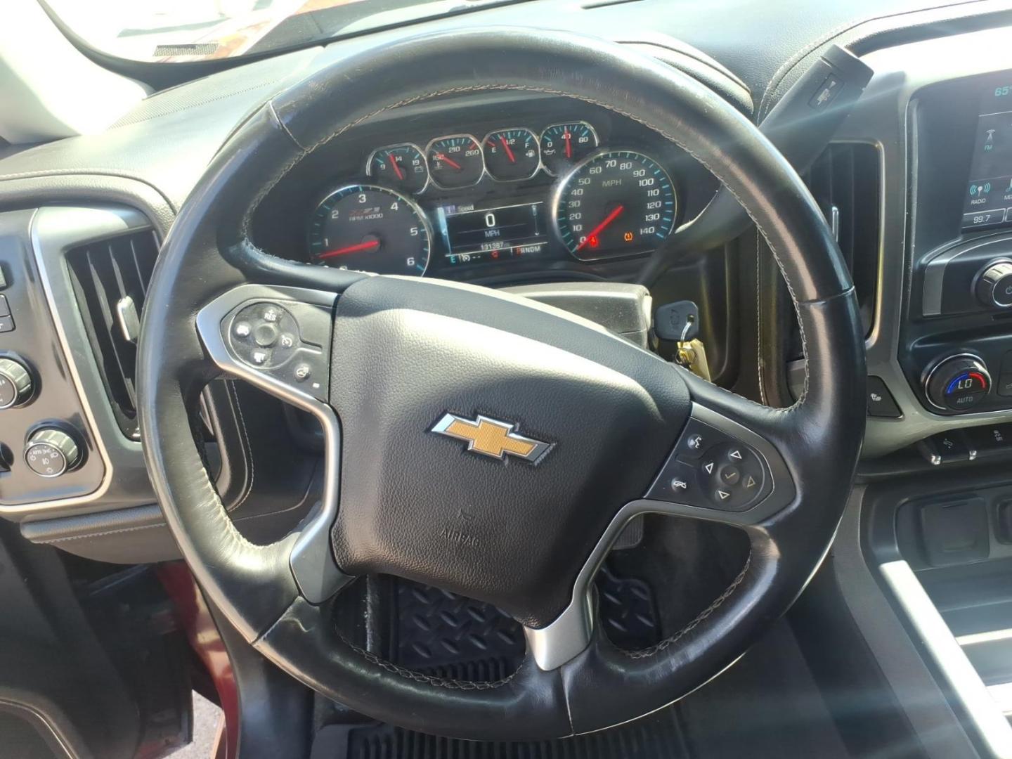 2016 Siren Red Tintcoat G1e Chevrolet Silverado 1500 LTZ (1GCVKSEC3GZ) with an 5.3L EcoTec3 5.3L V8 355hp 383ft. lbs. Direct Injection engine, 8-Speed Shiftable Automatic transmission, located at 5505 N. Summit St., Toledo, OH, 43611, (419) 729-2688, 41.654953, -83.530014 - Photo#3
