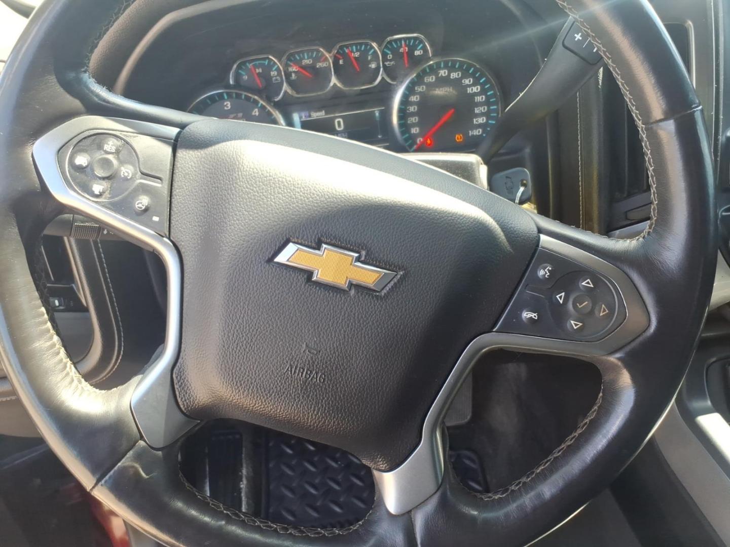2016 Siren Red Tintcoat G1e Chevrolet Silverado 1500 LTZ (1GCVKSEC3GZ) with an 5.3L EcoTec3 5.3L V8 355hp 383ft. lbs. Direct Injection engine, 8-Speed Shiftable Automatic transmission, located at 5505 N. Summit St., Toledo, OH, 43611, (419) 729-2688, 41.654953, -83.530014 - Photo#4