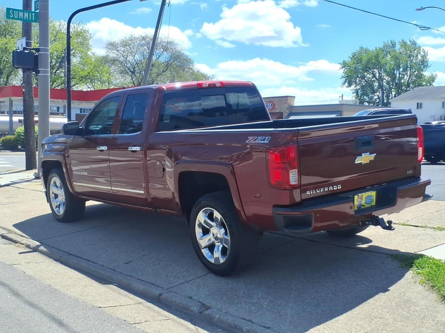 2016 Siren Red Tintcoat G1e Chevrolet Silverado 1500 LTZ (1GCVKSEC3GZ) with an 5.3L EcoTec3 5.3L V8 355hp 383ft. lbs. Direct Injection engine, 8-Speed Shiftable Automatic transmission, located at 5505 N. Summit St., Toledo, OH, 43611, (419) 729-2688, 41.654953, -83.530014 - Photo#18