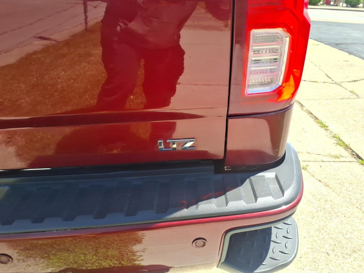 2016 Siren Red Tintcoat G1e Chevrolet Silverado 1500 LTZ (1GCVKSEC3GZ) with an 5.3L EcoTec3 5.3L V8 355hp 383ft. lbs. Direct Injection engine, 8-Speed Shiftable Automatic transmission, located at 5505 N. Summit St., Toledo, OH, 43611, (419) 729-2688, 41.654953, -83.530014 - Photo#27