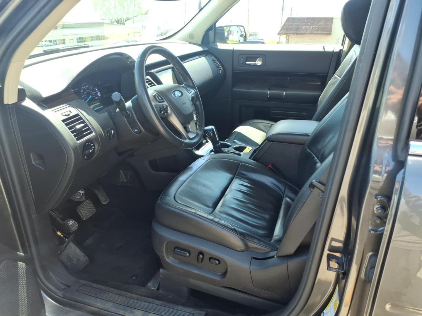 2019 Magnetic J7 Ford Flex SEL (2FMHK6C83KB) with an 3.5L 3.5L V6 287hp 254ft. lbs. Sequential Multiport Fuel Injection engine, 6-Speed Shiftable Automatic transmission, located at 5505 N. Summit St., Toledo, OH, 43611, (419) 729-2688, 41.654953, -83.530014 - Photo#1