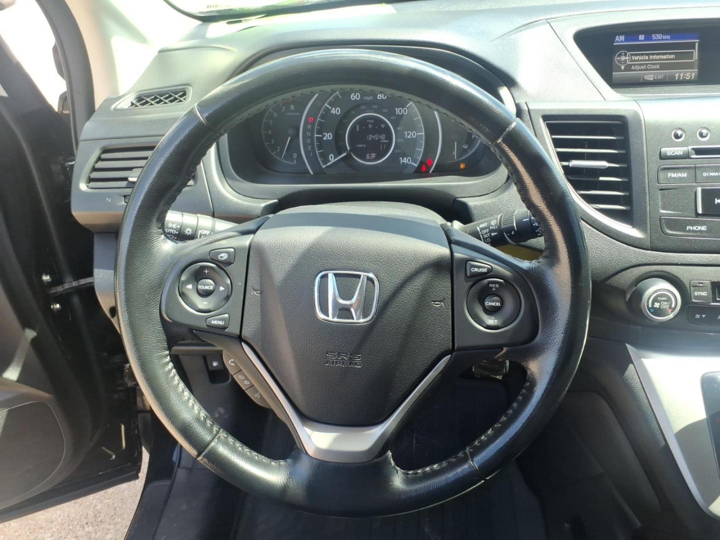 2012 Crystal Black Pearl Bk Honda CR-V EX-L (2HKRM4H75CH) with an 2.4L 2.4L I4 185hp 163ft. lbs. Sequential Multiport Fuel Injection engine, 5-Speed Automatic transmission, located at 5505 N. Summit St., Toledo, OH, 43611, (419) 729-2688, 41.654953, -83.530014 - Photo#4