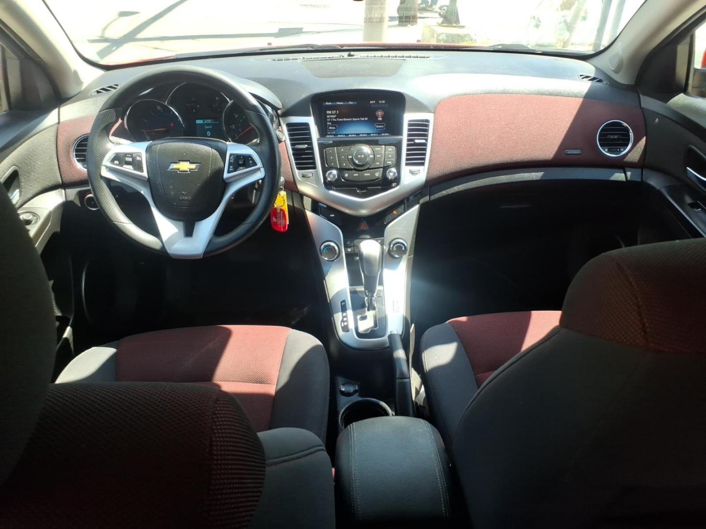 2015 Red Hot G7c Chevrolet Cruze 1LT Auto (1G1PC5SBXF7) with an 1.4L Ecotec 1.4L Turbo I4 138hp 148ft. lbs. Sequential Multiport Fuel Injection engine, 6-Speed Shiftable Automatic w/Overdrive transmission, located at 5505 N. Summit St., Toledo, OH, 43611, (419) 729-2688, 41.654953, -83.530014 - Photo#17