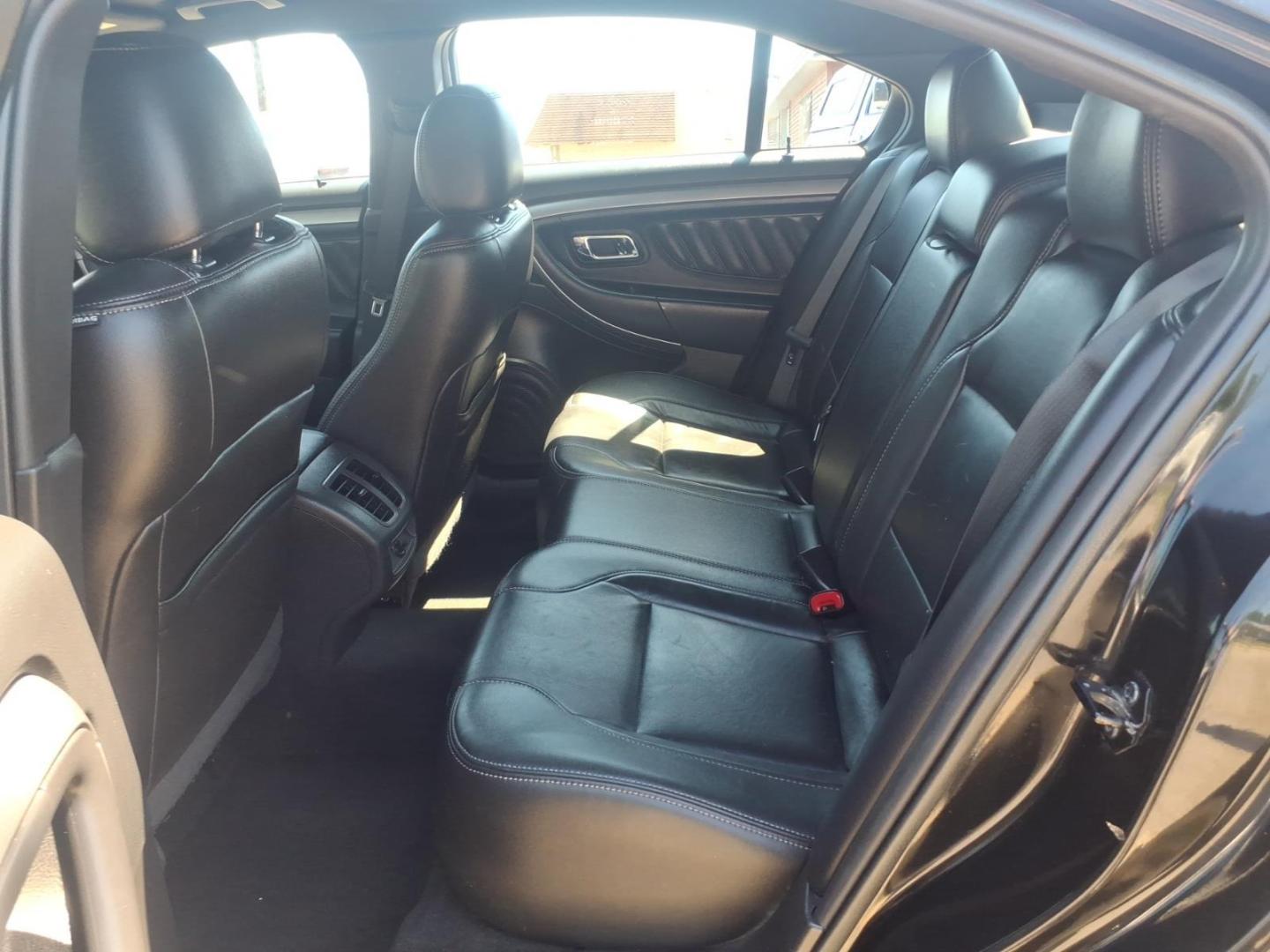 2013 Black Ford Taurus SEL (1FAHP2H84DG) with an 3.5L V6 288hp 254ft. lbs. Sequential Multiport Fuel Injection engine, 6-Speed Shiftable Automatic transmission, located at 5505 N. Summit St., Toledo, OH, 43611, (419) 729-2688, 41.654953, -83.530014 - Photo#15