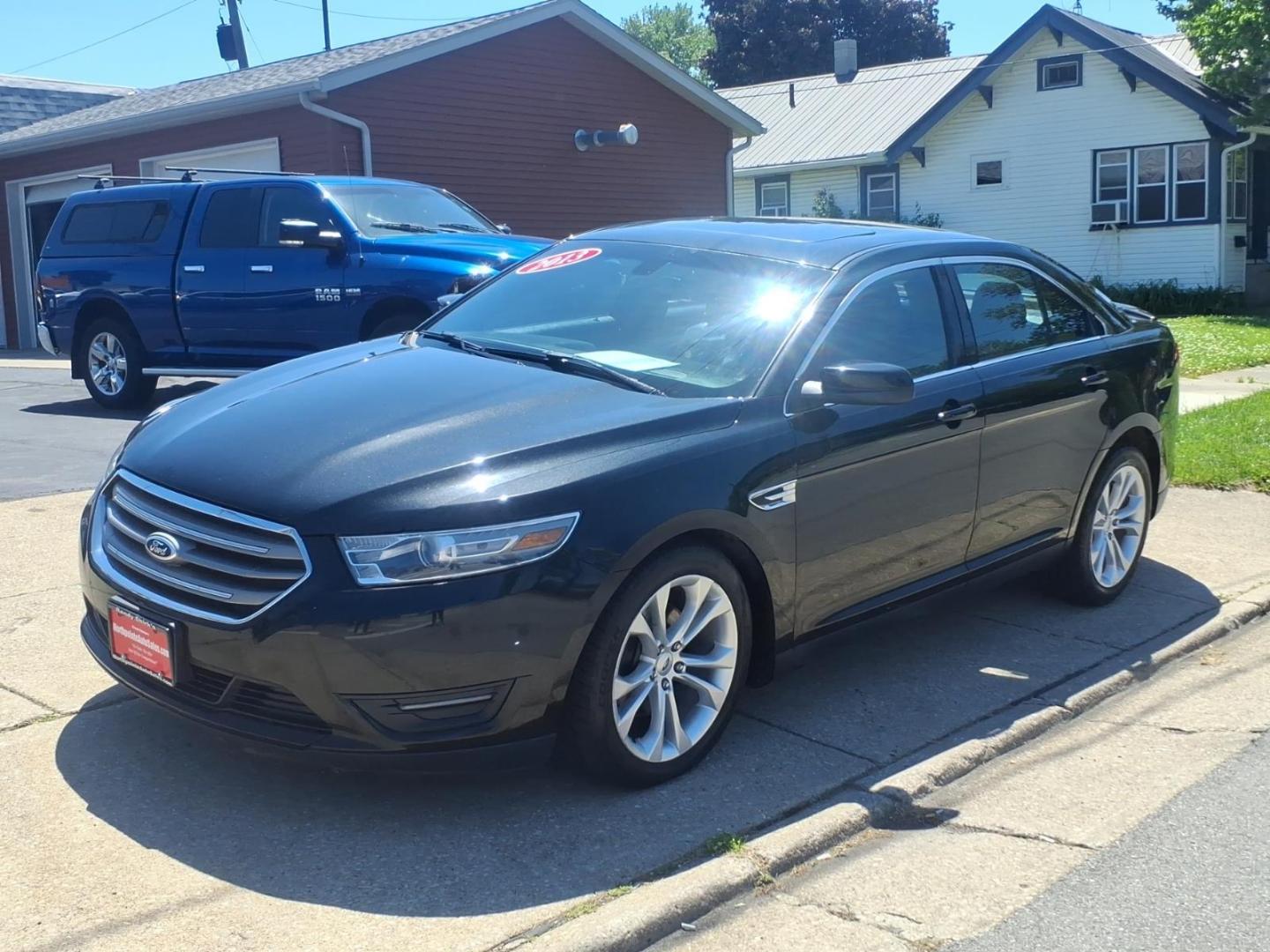 2013 Black Ford Taurus SEL (1FAHP2H84DG) with an 3.5L V6 288hp 254ft. lbs. Sequential Multiport Fuel Injection engine, 6-Speed Shiftable Automatic transmission, located at 5505 N. Summit St., Toledo, OH, 43611, (419) 729-2688, 41.654953, -83.530014 - Photo#22
