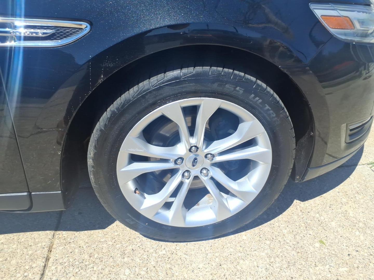2013 Black Ford Taurus SEL (1FAHP2H84DG) with an 3.5L V6 288hp 254ft. lbs. Sequential Multiport Fuel Injection engine, 6-Speed Shiftable Automatic transmission, located at 5505 N. Summit St., Toledo, OH, 43611, (419) 729-2688, 41.654953, -83.530014 - Photo#30