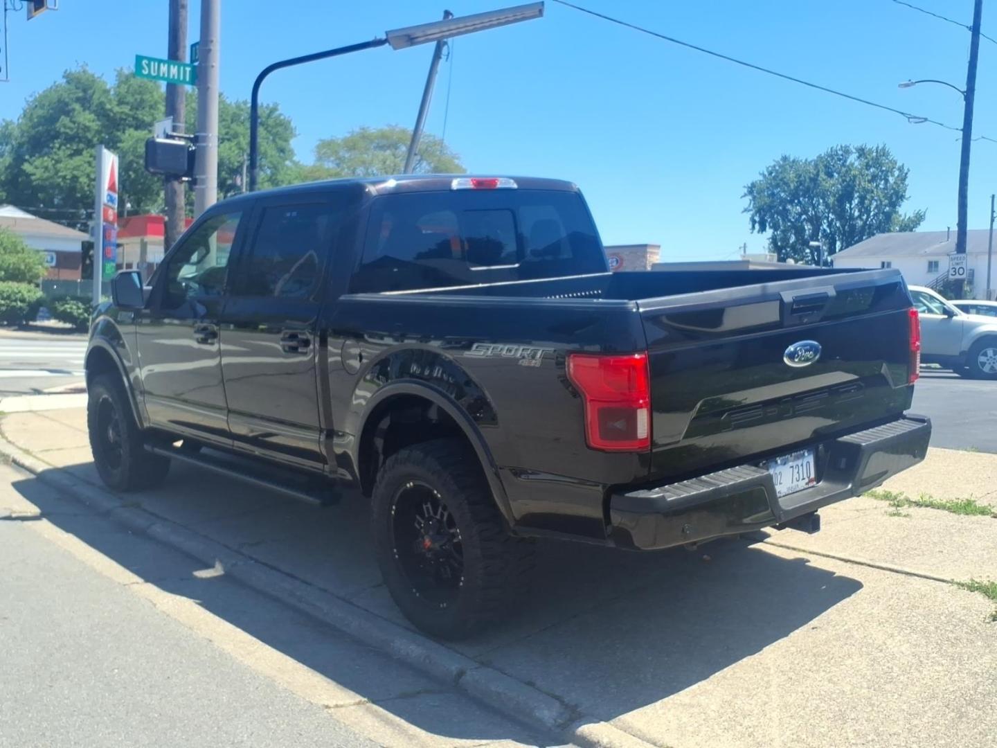 2018 Ruby Red Metallic Tinted Clearcoat Ford F-150 XLT (1FTEW1E53JF) with an 5.0L V8 395hp 400ft. lbs. Direct Injection engine, 10-Speed Shiftable Automatic transmission, located at 5505 N. Summit St., Toledo, OH, 43611, (419) 729-2688, 41.654953, -83.530014 - Photo#16