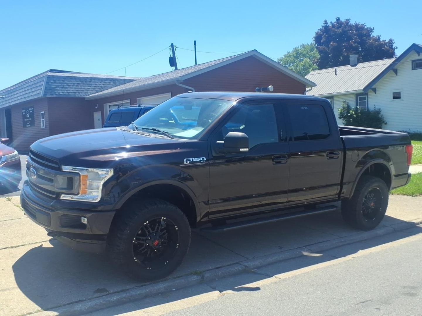 2018 Ruby Red Metallic Tinted Clearcoat Ford F-150 XLT (1FTEW1E53JF) with an 5.0L V8 395hp 400ft. lbs. Direct Injection engine, 10-Speed Shiftable Automatic transmission, located at 5505 N. Summit St., Toledo, OH, 43611, (419) 729-2688, 41.654953, -83.530014 - Photo#21