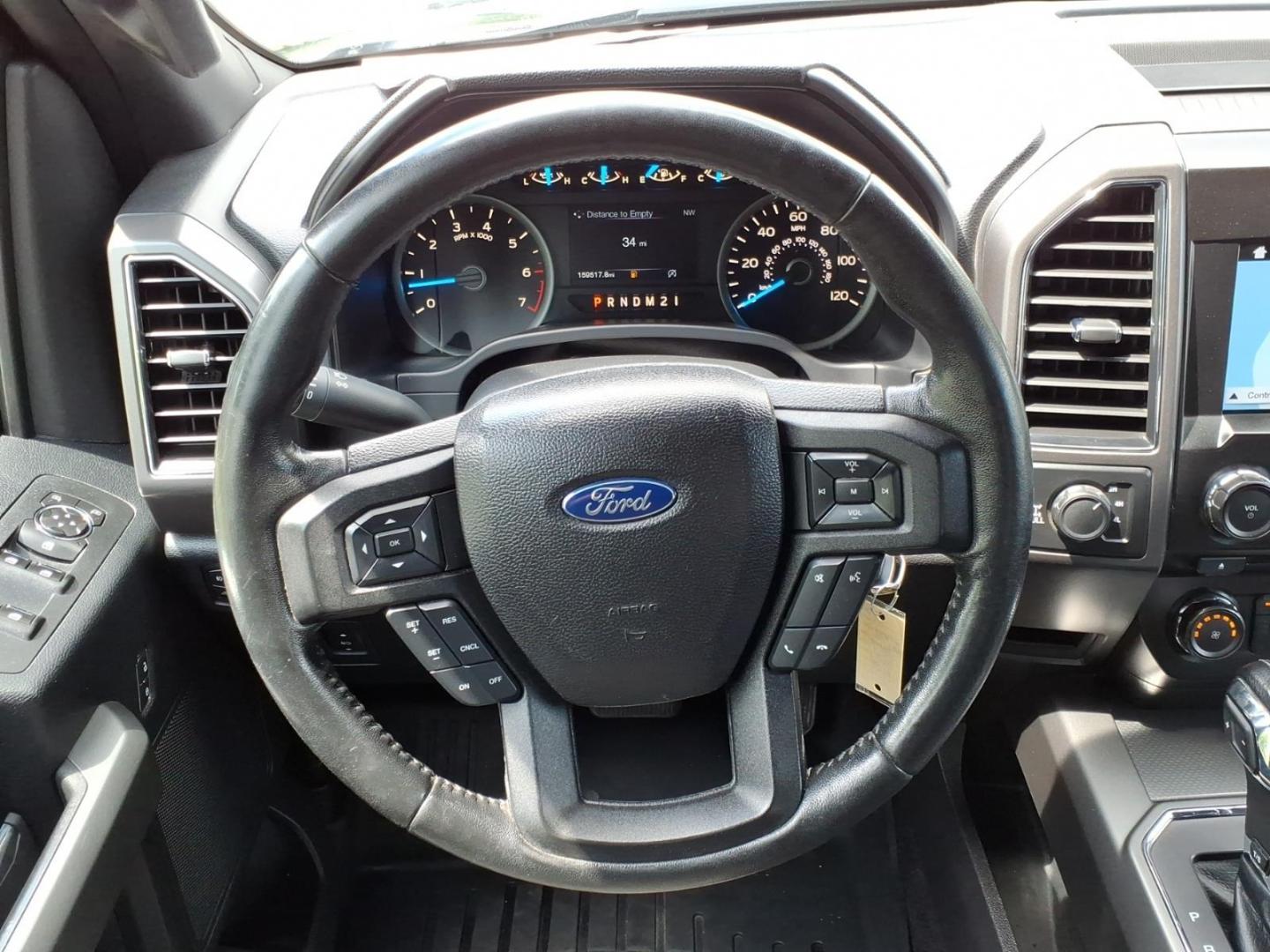 2017 Black Ford F-150 XLT (1FTEW1EP1HF) with an 2.7L EcoBoost 2.7L Twin Turbo V6 325hp 375ft. lbs. Direct Injection engine, 6-Speed Shiftable Automatic transmission, located at 5505 N. Summit St., Toledo, OH, 43611, (419) 729-2688, 41.654953, -83.530014 - Photo#16