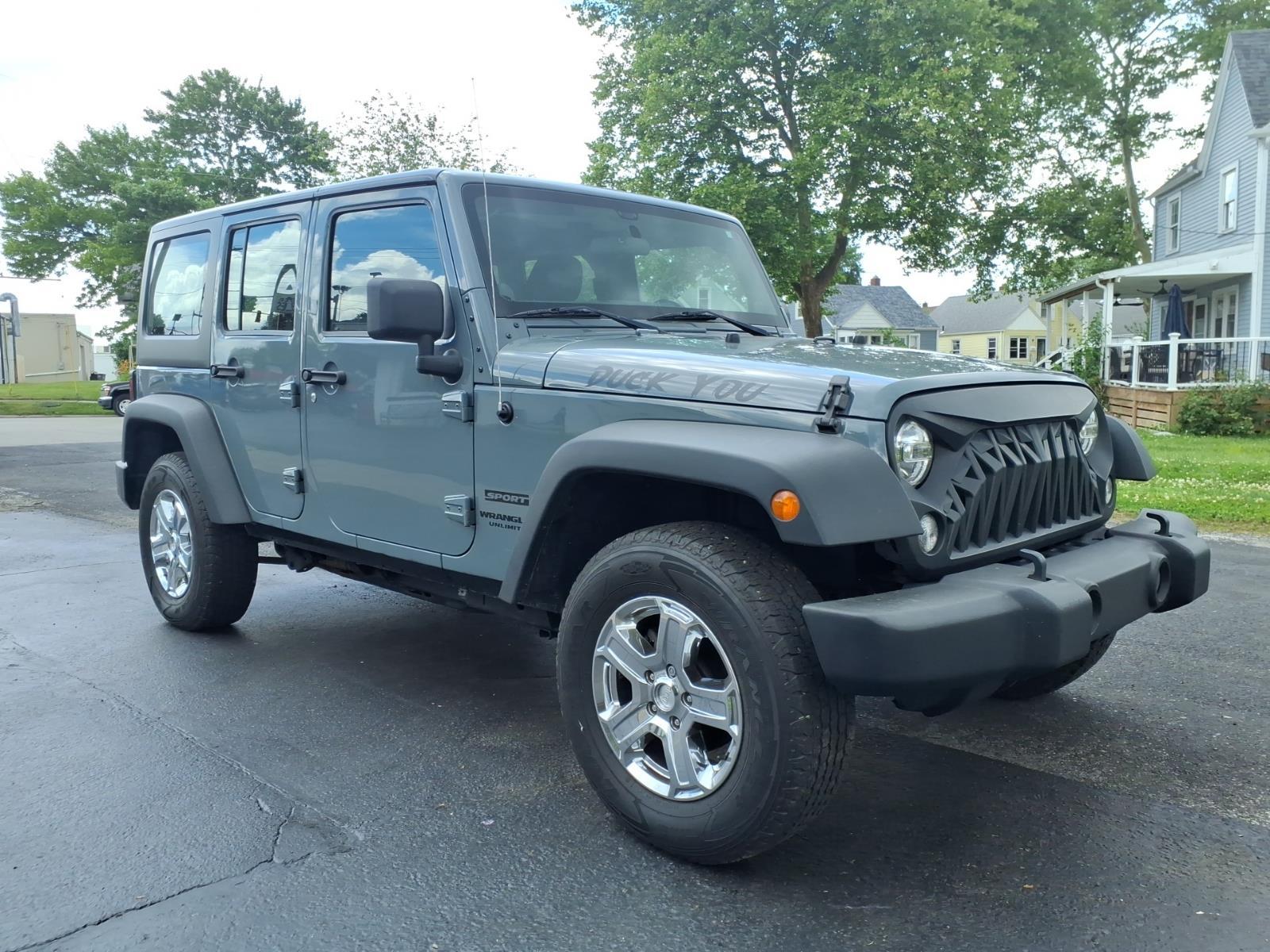 photo of 2014 Jeep Wrangler Unlimited Sport
