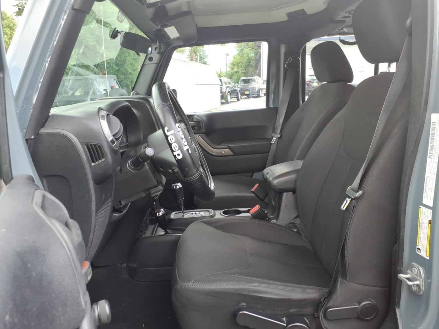 2014 Gray Jeep Wrangler Unlimited Sport (1C4BJWDG7EL) with an 3.6L 3.6L V6 285hp 260ft. lbs. Sequential Multiport Fuel Injection engine, Automatic transmission, located at 5505 N. Summit St., Toledo, OH, 43611, (419) 729-2688, 41.654953, -83.530014 - Photo#1