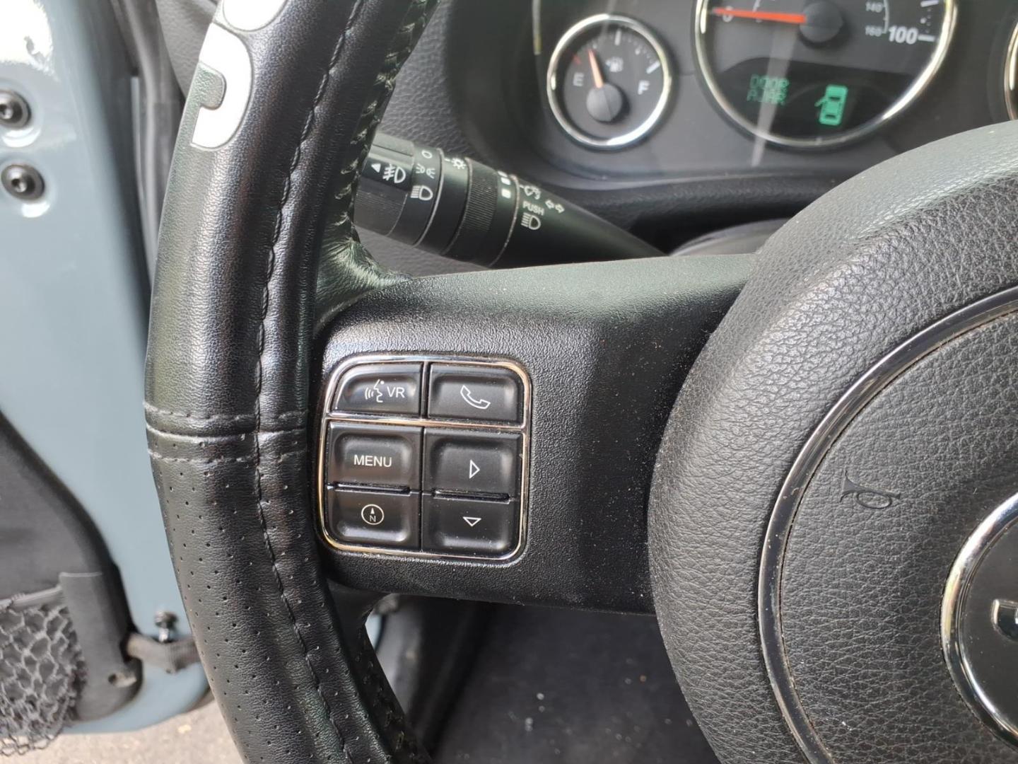 2014 Gray Jeep Wrangler Unlimited Sport (1C4BJWDG7EL) with an 3.6L 3.6L V6 285hp 260ft. lbs. Sequential Multiport Fuel Injection engine, Automatic transmission, located at 5505 N. Summit St., Toledo, OH, 43611, (419) 729-2688, 41.654953, -83.530014 - Photo#3