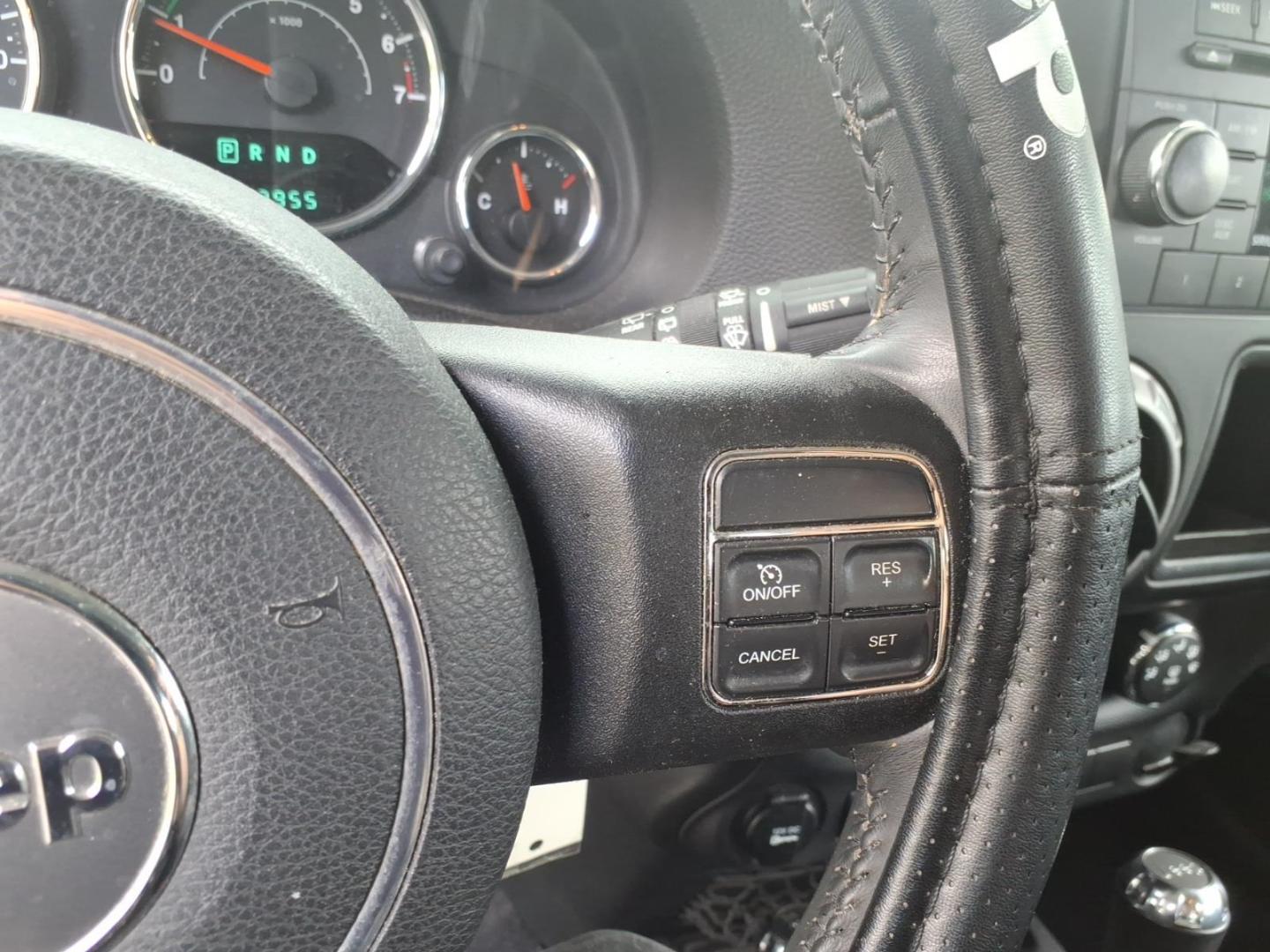 2014 Gray Jeep Wrangler Unlimited Sport (1C4BJWDG7EL) with an 3.6L 3.6L V6 285hp 260ft. lbs. Sequential Multiport Fuel Injection engine, Automatic transmission, located at 5505 N. Summit St., Toledo, OH, 43611, (419) 729-2688, 41.654953, -83.530014 - Photo#4