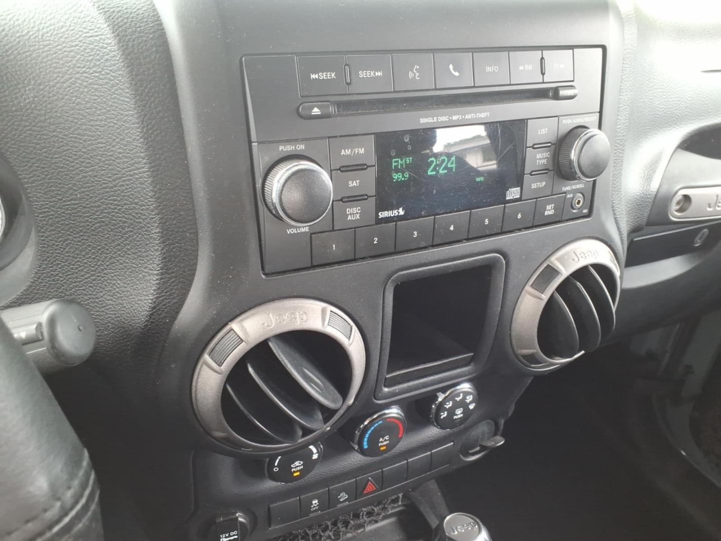 2014 Gray Jeep Wrangler Unlimited Sport (1C4BJWDG7EL) with an 3.6L 3.6L V6 285hp 260ft. lbs. Sequential Multiport Fuel Injection engine, Automatic transmission, located at 5505 N. Summit St., Toledo, OH, 43611, (419) 729-2688, 41.654953, -83.530014 - Photo#6