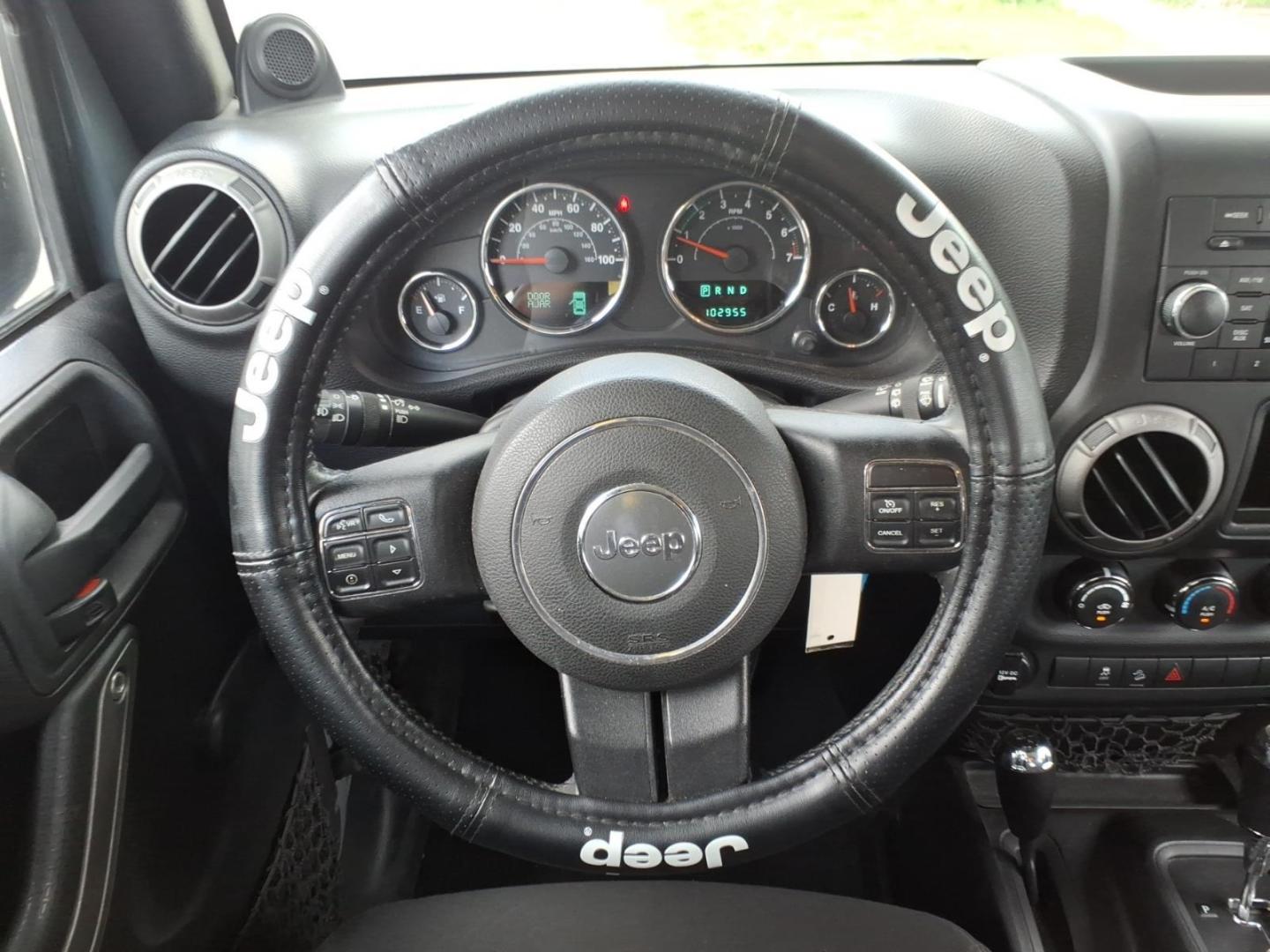 2014 Gray Jeep Wrangler Unlimited Sport (1C4BJWDG7EL) with an 3.6L 3.6L V6 285hp 260ft. lbs. Sequential Multiport Fuel Injection engine, Automatic transmission, located at 5505 N. Summit St., Toledo, OH, 43611, (419) 729-2688, 41.654953, -83.530014 - Photo#10