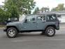 2014 Gray Jeep Wrangler Unlimited Sport (1C4BJWDG7EL) with an 3.6L 3.6L V6 285hp 260ft. lbs. Sequential Multiport Fuel Injection engine, Automatic transmission, located at 5505 N. Summit St., Toledo, OH, 43611, (419) 729-2688, 41.654953, -83.530014 - Photo#12