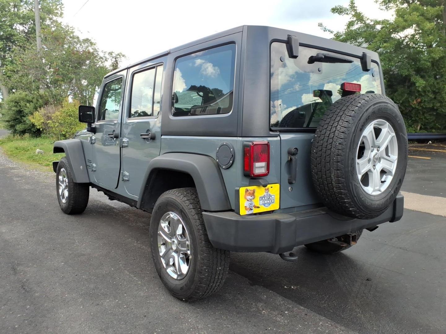 2014 Gray Jeep Wrangler Unlimited Sport (1C4BJWDG7EL) with an 3.6L 3.6L V6 285hp 260ft. lbs. Sequential Multiport Fuel Injection engine, Automatic transmission, located at 5505 N. Summit St., Toledo, OH, 43611, (419) 729-2688, 41.654953, -83.530014 - Photo#13