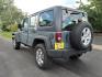 2014 Gray Jeep Wrangler Unlimited Sport (1C4BJWDG7EL) with an 3.6L 3.6L V6 285hp 260ft. lbs. Sequential Multiport Fuel Injection engine, Automatic transmission, located at 5505 N. Summit St., Toledo, OH, 43611, (419) 729-2688, 41.654953, -83.530014 - Photo#13