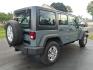 2014 Gray Jeep Wrangler Unlimited Sport (1C4BJWDG7EL) with an 3.6L 3.6L V6 285hp 260ft. lbs. Sequential Multiport Fuel Injection engine, Automatic transmission, located at 5505 N. Summit St., Toledo, OH, 43611, (419) 729-2688, 41.654953, -83.530014 - Photo#15