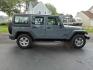 2014 Gray Jeep Wrangler Unlimited Sport (1C4BJWDG7EL) with an 3.6L 3.6L V6 285hp 260ft. lbs. Sequential Multiport Fuel Injection engine, Automatic transmission, located at 5505 N. Summit St., Toledo, OH, 43611, (419) 729-2688, 41.654953, -83.530014 - Photo#16