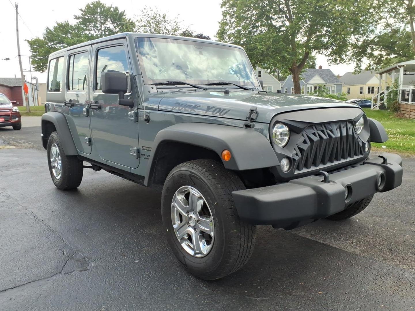 2014 Gray Jeep Wrangler Unlimited Sport (1C4BJWDG7EL) with an 3.6L 3.6L V6 285hp 260ft. lbs. Sequential Multiport Fuel Injection engine, Automatic transmission, located at 5505 N. Summit St., Toledo, OH, 43611, (419) 729-2688, 41.654953, -83.530014 - Photo#17