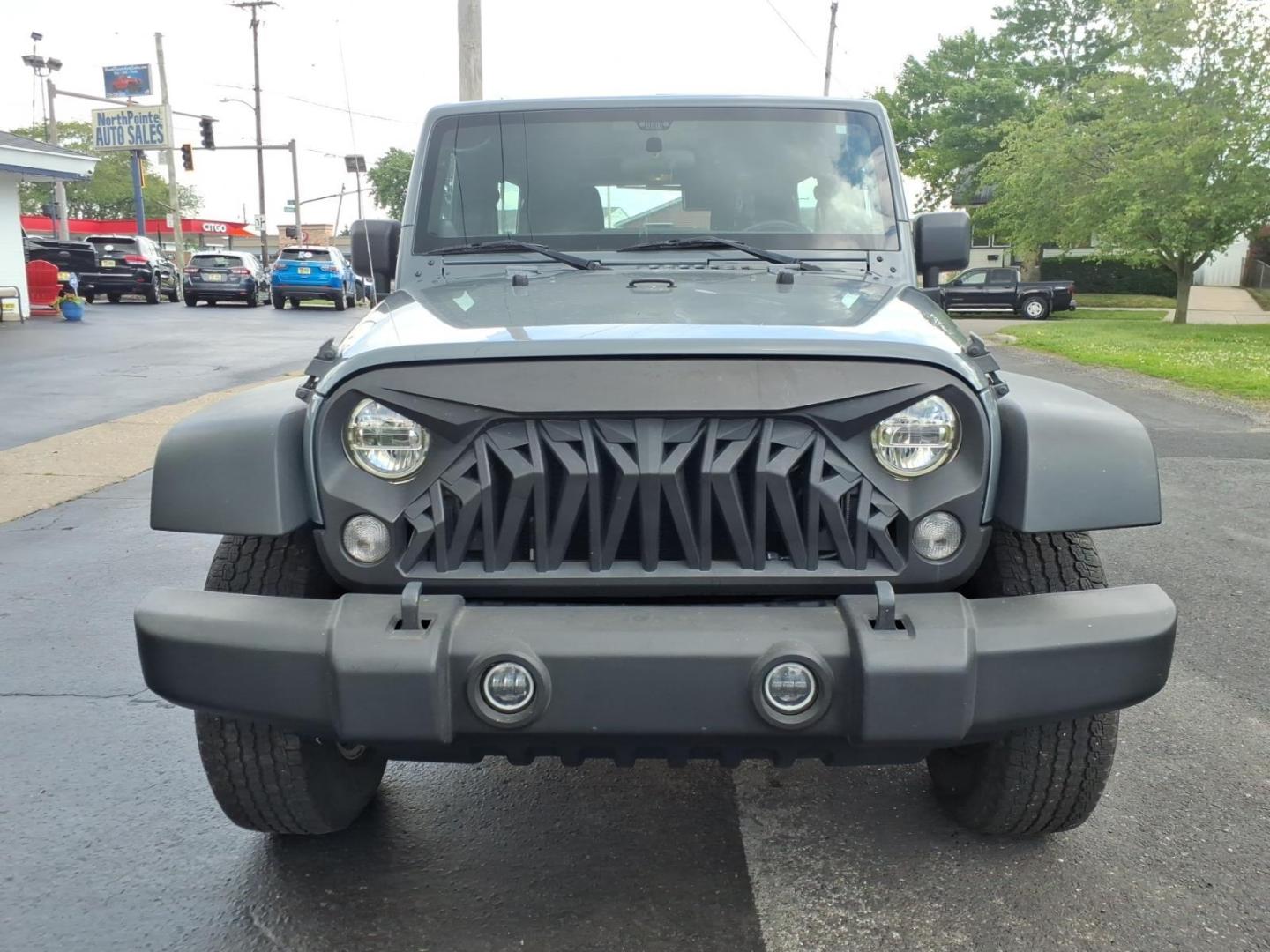 2014 Gray Jeep Wrangler Unlimited Sport (1C4BJWDG7EL) with an 3.6L 3.6L V6 285hp 260ft. lbs. Sequential Multiport Fuel Injection engine, Automatic transmission, located at 5505 N. Summit St., Toledo, OH, 43611, (419) 729-2688, 41.654953, -83.530014 - Photo#18