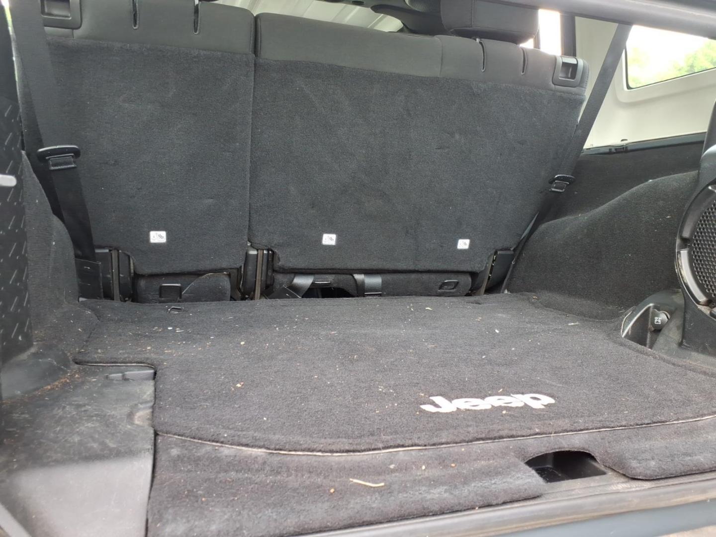 2014 Gray Jeep Wrangler Unlimited Sport (1C4BJWDG7EL) with an 3.6L 3.6L V6 285hp 260ft. lbs. Sequential Multiport Fuel Injection engine, Automatic transmission, located at 5505 N. Summit St., Toledo, OH, 43611, (419) 729-2688, 41.654953, -83.530014 - Photo#19