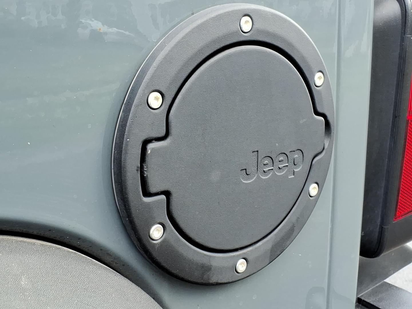 2014 Gray Jeep Wrangler Unlimited Sport (1C4BJWDG7EL) with an 3.6L 3.6L V6 285hp 260ft. lbs. Sequential Multiport Fuel Injection engine, Automatic transmission, located at 5505 N. Summit St., Toledo, OH, 43611, (419) 729-2688, 41.654953, -83.530014 - Photo#26