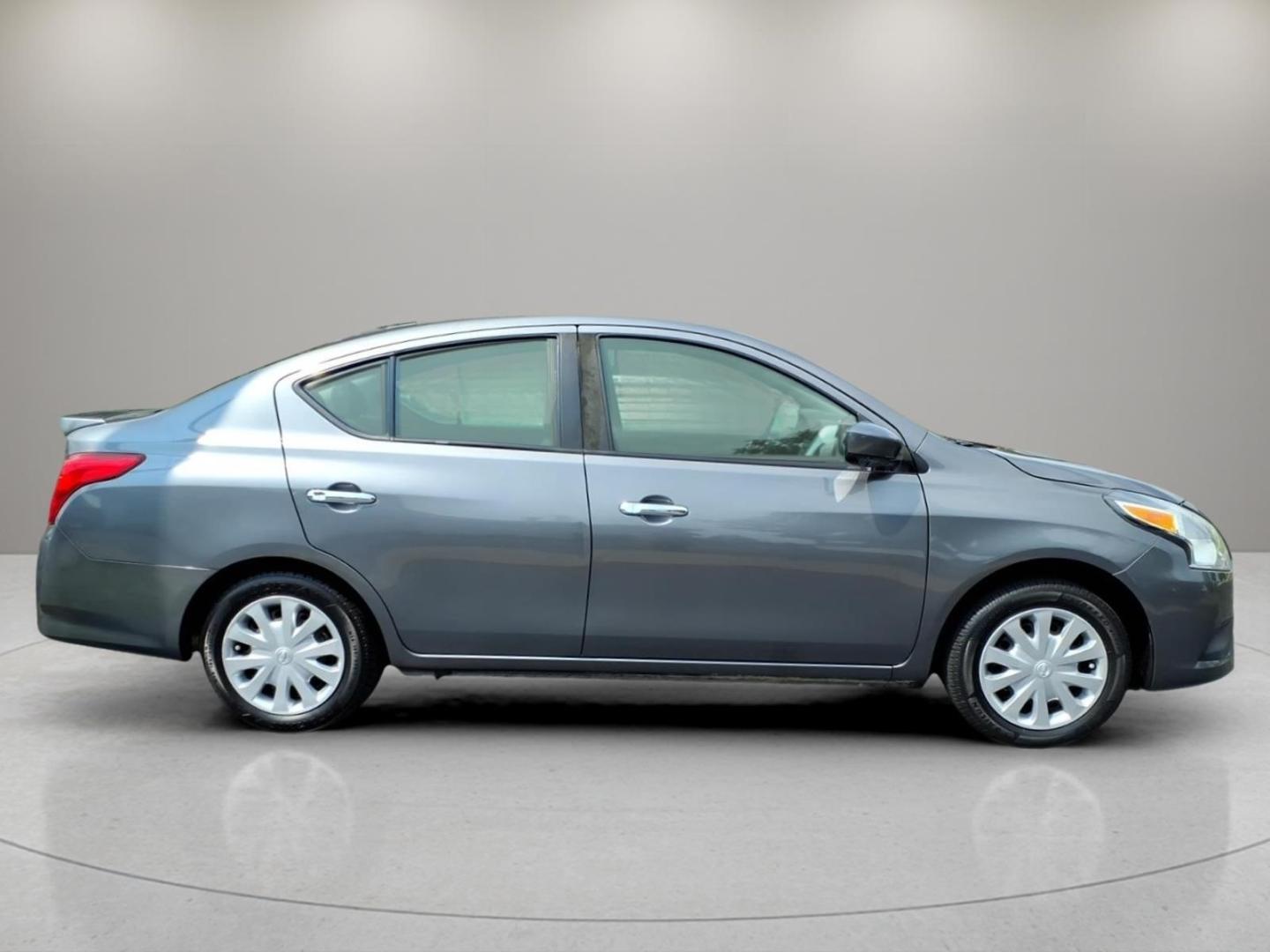 2019 Gray Nissan Versa S (3N1CN7AP1KL) with an 1.6L 1.6L I4 109hp 107ft. lbs. Sequential Multiport Fuel Injection engine, 5-Speed Manual transmission, located at 5505 N. Summit St., Toledo, OH, 43611, (419) 729-2688, 41.654953, -83.530014- Photo#18