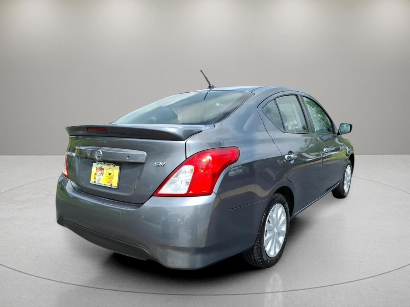 2019 Gray Nissan Versa S (3N1CN7AP1KL) with an 1.6L 1.6L I4 109hp 107ft. lbs. Sequential Multiport Fuel Injection engine, 5-Speed Manual transmission, located at 5505 N. Summit St., Toledo, OH, 43611, (419) 729-2688, 41.654953, -83.530014- Photo#19