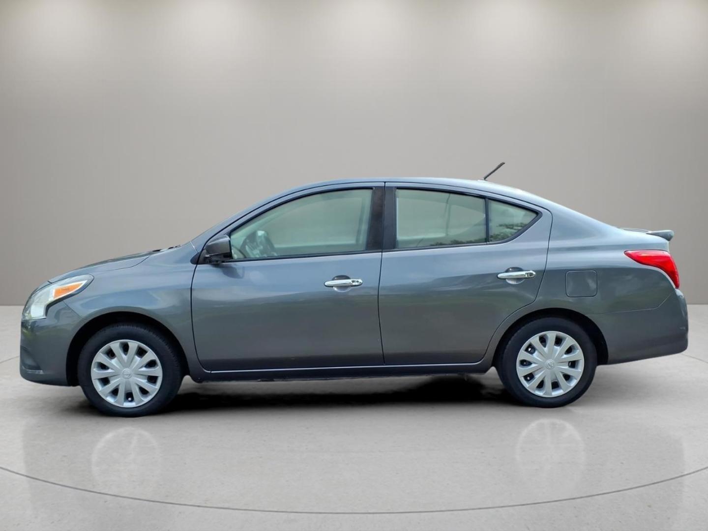 2019 Gray Nissan Versa S (3N1CN7AP1KL) with an 1.6L 1.6L I4 109hp 107ft. lbs. Sequential Multiport Fuel Injection engine, 5-Speed Manual transmission, located at 5505 N. Summit St., Toledo, OH, 43611, (419) 729-2688, 41.654953, -83.530014- Photo#22