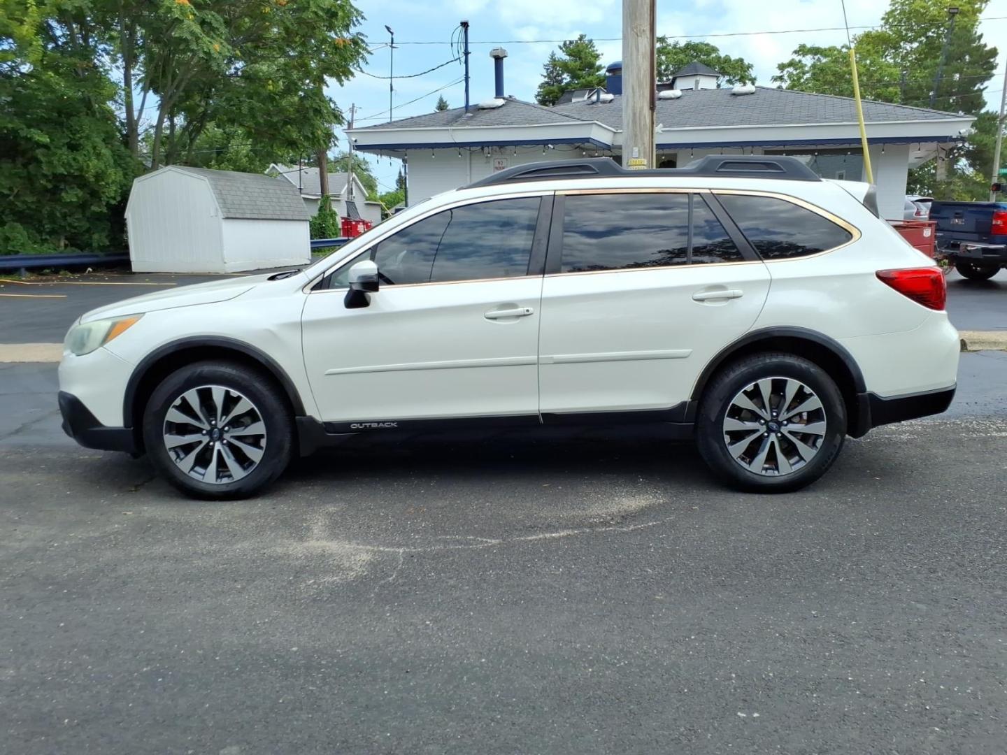 2015 Crystal White Pearl Whc Subaru Outback 3.6R Limited (4S4BSENC1F3) with an 3.6L 3.6L H6 256hp 247ft. lbs. Sequential Multiport Fuel Injection engine, CVT transmission, located at 5505 N. Summit St., Toledo, OH, 43611, (419) 729-2688, 41.654953, -83.530014- Photo#26