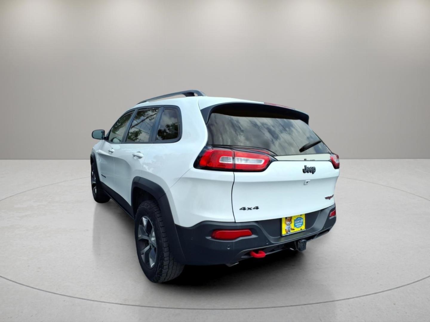 2016 Bright White Clear Coat Pw7 Jeep Cherokee Trailhawk (1C4PJMBS3GW) with an 3.2L 3.2L V6 271hp 239ft. lbs. Sequential Multiport Fuel Injection engine, 4WD 9-Speed Shiftable Automatic transmission, located at 5505 N. Summit St., Toledo, OH, 43611, (419) 729-2688, 41.654953, -83.530014- Photo#24