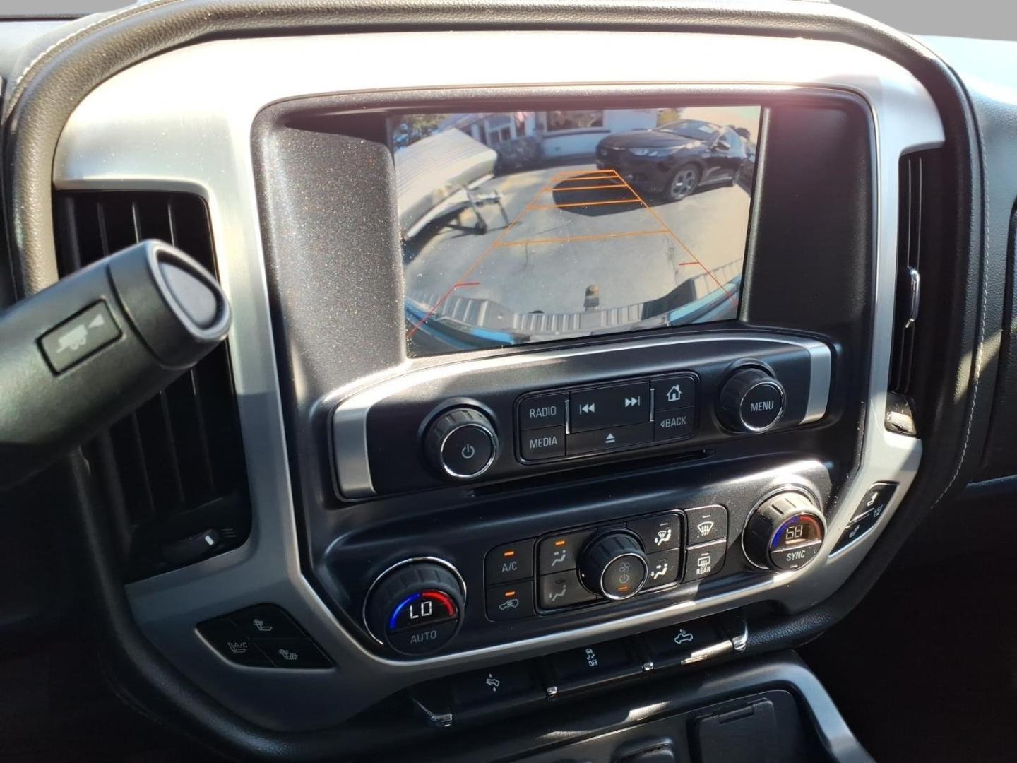 2015 Stone Blue Metallic G1k GMC Sierra 1500 SLT (3GTU2VEJXFG) with an 6.2L EcoTec3 6.2L V8 420hp 460ft. lbs. Direct Injection engine, 8-Speed Shiftable Automatic transmission, located at 5505 N. Summit St., Toledo, OH, 43611, (419) 729-2688, 41.654953, -83.530014- Photo#11