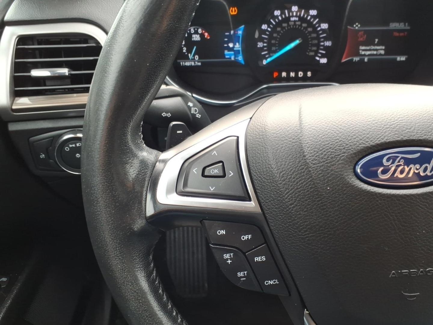 2018 Magnetic J7 Ford Fusion SE (3FA6P0T91JR) with an 2.0L EcoBoost 2.0L Turbo I4 245hp 275ft. lbs. Direct Injection engine, 6-Speed Shiftable Automatic transmission, located at 5505 N. Summit St., Toledo, OH, 43611, (419) 729-2688, 41.654953, -83.530014- Photo#7