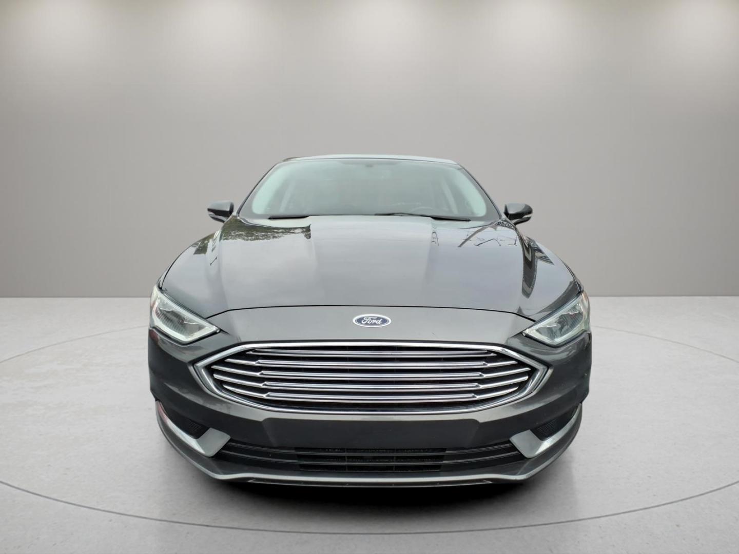 2018 Magnetic J7 Ford Fusion SE (3FA6P0T91JR) with an 2.0L EcoBoost 2.0L Turbo I4 245hp 275ft. lbs. Direct Injection engine, 6-Speed Shiftable Automatic transmission, located at 5505 N. Summit St., Toledo, OH, 43611, (419) 729-2688, 41.654953, -83.530014- Photo#19