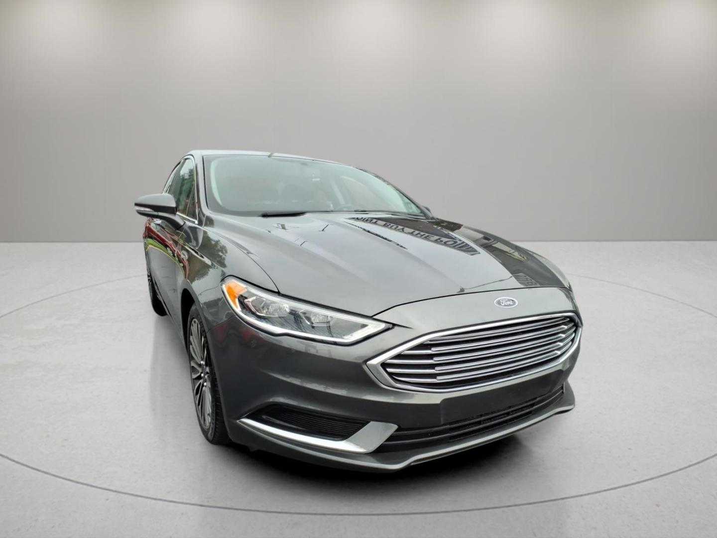 2018 Magnetic J7 Ford Fusion SE (3FA6P0T91JR) with an 2.0L EcoBoost 2.0L Turbo I4 245hp 275ft. lbs. Direct Injection engine, 6-Speed Shiftable Automatic transmission, located at 5505 N. Summit St., Toledo, OH, 43611, (419) 729-2688, 41.654953, -83.530014- Photo#20