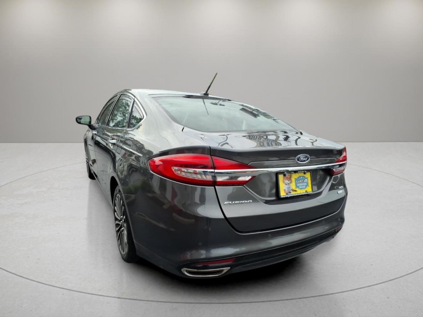2018 Magnetic J7 Ford Fusion SE (3FA6P0T91JR) with an 2.0L EcoBoost 2.0L Turbo I4 245hp 275ft. lbs. Direct Injection engine, 6-Speed Shiftable Automatic transmission, located at 5505 N. Summit St., Toledo, OH, 43611, (419) 729-2688, 41.654953, -83.530014- Photo#24
