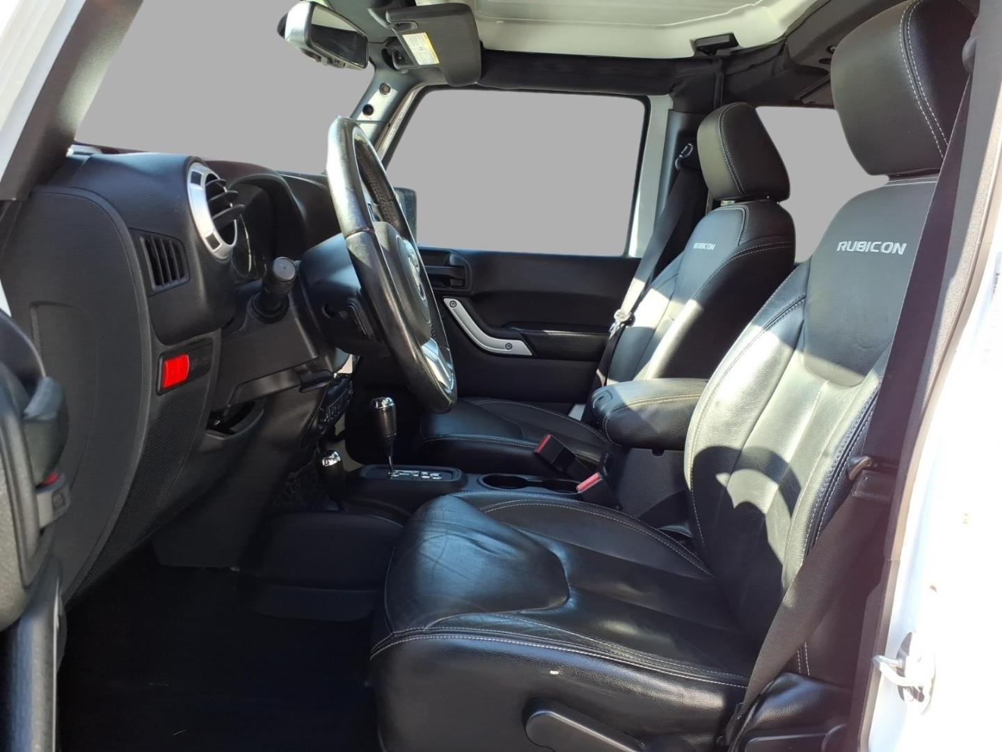 2016 Bright White Clear Coat Jeep Wrangler Unlimited Rubicon (1C4BJWFG4GL) with an 3.6L 3.6L V6 285hp 260ft. lbs. Fuel Injected engine, Automatic transmission, located at 5505 N. Summit St., Toledo, OH, 43611, (419) 729-2688, 41.654953, -83.530014- Photo#1