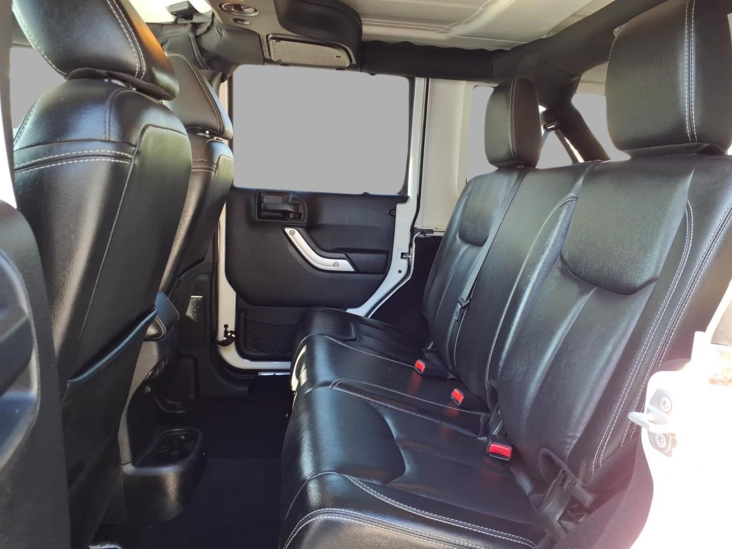 2016 Bright White Clear Coat Jeep Wrangler Unlimited Rubicon (1C4BJWFG4GL) with an 3.6L 3.6L V6 285hp 260ft. lbs. Fuel Injected engine, Automatic transmission, located at 5505 N. Summit St., Toledo, OH, 43611, (419) 729-2688, 41.654953, -83.530014- Photo#11