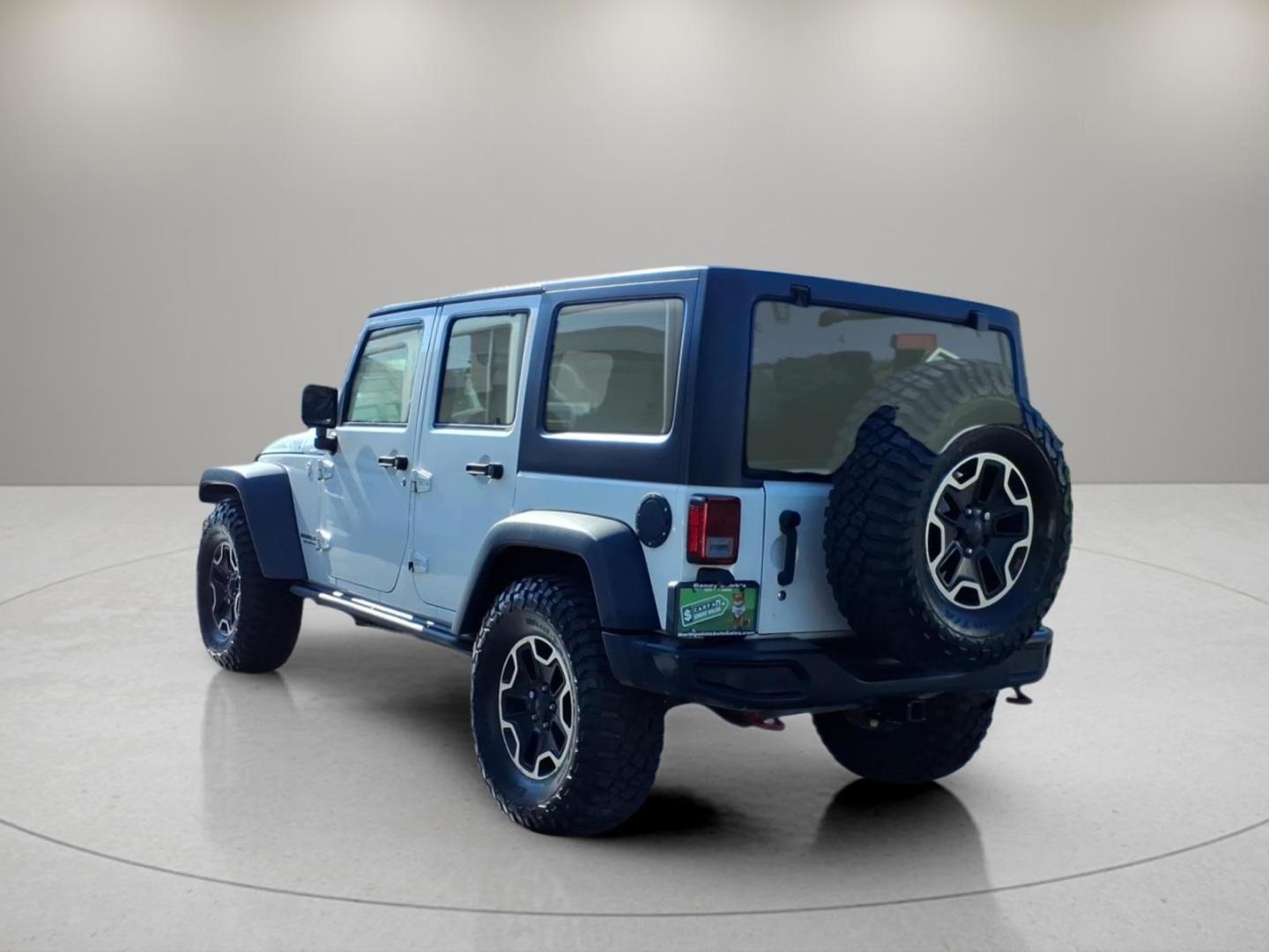 2016 Bright White Clear Coat Jeep Wrangler Unlimited Rubicon (1C4BJWFG4GL) with an 3.6L 3.6L V6 285hp 260ft. lbs. Fuel Injected engine, Automatic transmission, located at 5505 N. Summit St., Toledo, OH, 43611, (419) 729-2688, 41.654953, -83.530014- Photo#16